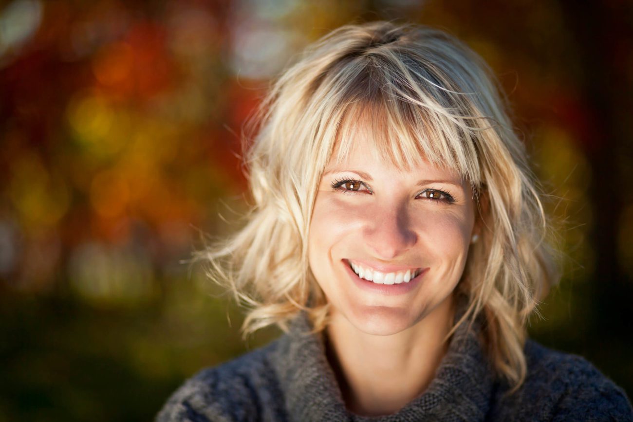 woman with beautiful smile teeth whitening timonium md